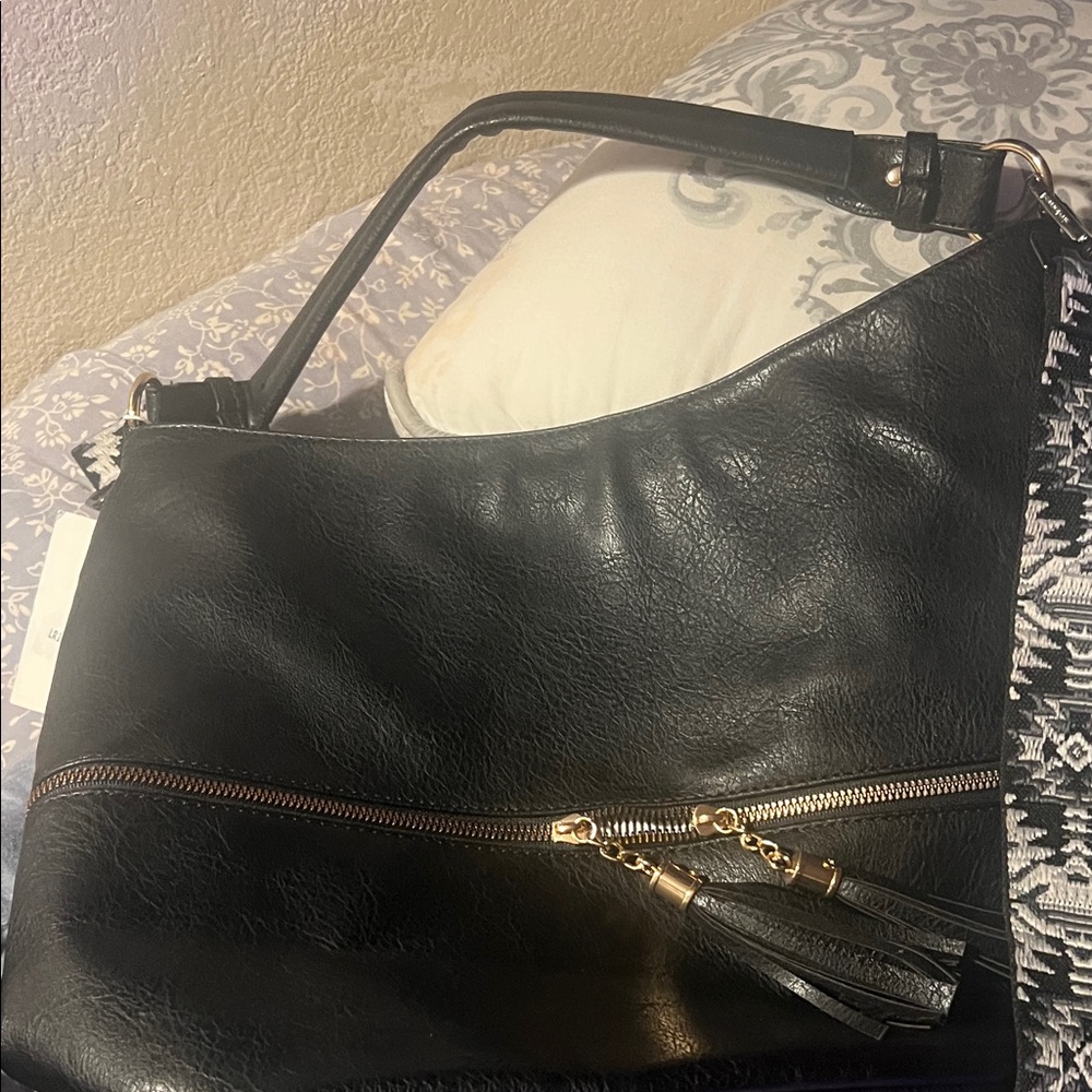 Chic Black Leather Shoulder Bag with Gold Accents